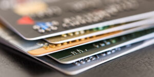 Stack of credit cards representing personal debt and borrowing