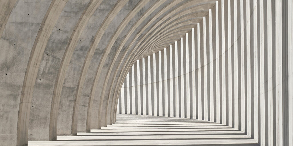 repeating architectural arches showing depth and progression symbolizing compound growth