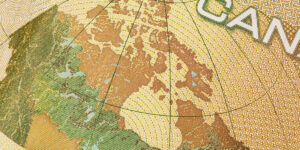 Canadian dollar banknote featuring a detailed map of Canada