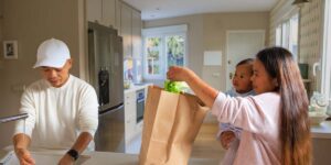 Your First 30 Days in Canada: A newcomer family settling into their new home.