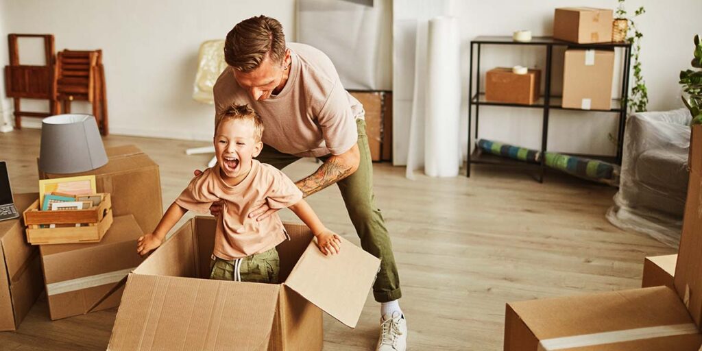 hidden costs of buying a home in Canada — homebuyers reviewing home purchase expenses and financial documents